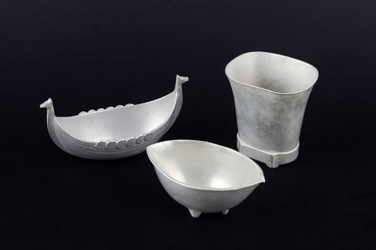 Just Andersen, DenmarkSmall pewter Viking ship bowl together with two other pewter vessels.