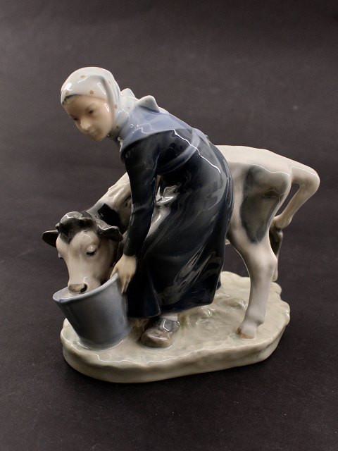 Royal Copenhagen girl with calf 779