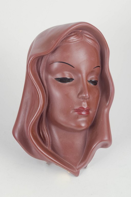 Goldscheider, wall mask.