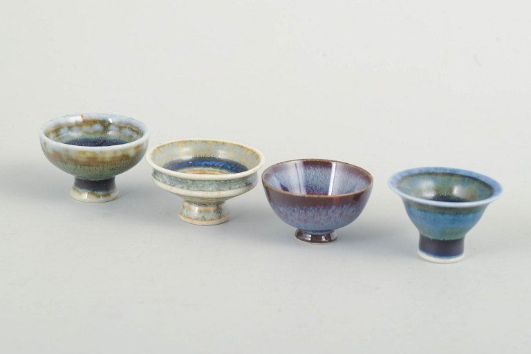 John Andersson for Höganäs Keramik, set of four unique miniature bowls.