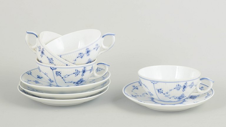 Royal Copenhagen Blue Fluted Plain, set of four tea cups with matching saucers.