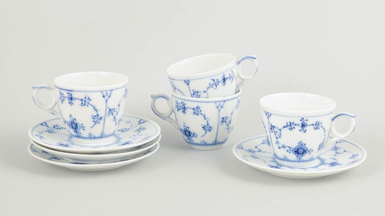 Royal Copenhagen Blue Fluted Plain, set of four demitasse cups with matching saucers.