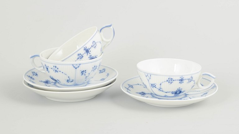 Royal Copenhagen Blue Fluted Plain set of three tea cups with matching saucers.