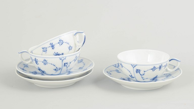 Royal Copenhagen Blue Fluted Plain set of three tea cups with matching saucers.