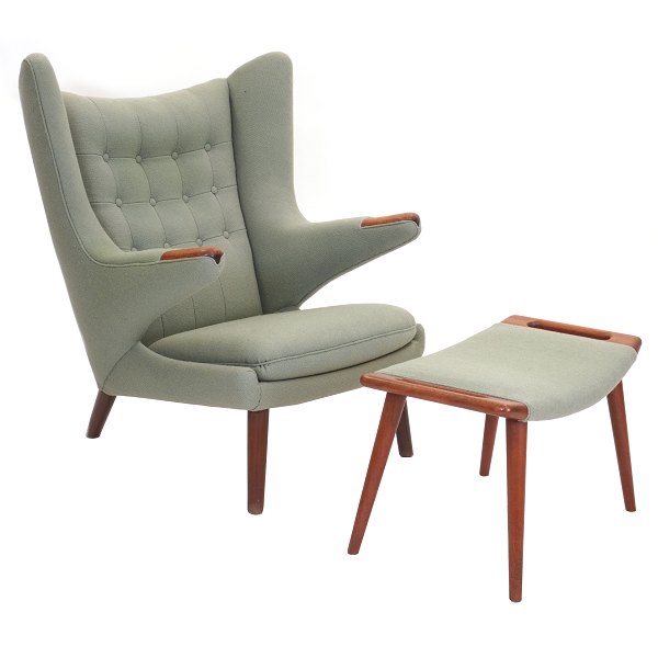 Hans J. Wegner “Papa Bear”. Wingback teak easy chair with matching stool. AP 19 and AP 29