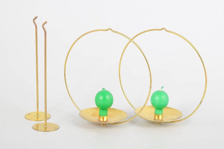 Kaija Aarikka and Timo Sarpaneva for Aarikka, set of two wall-mounted candleholders "Piirileikki".