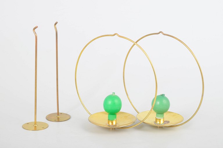 Kaija Aarikka and Timo Sarpaneva for Aarikka, set of two wall-mounted candleholders "Piirileikki".