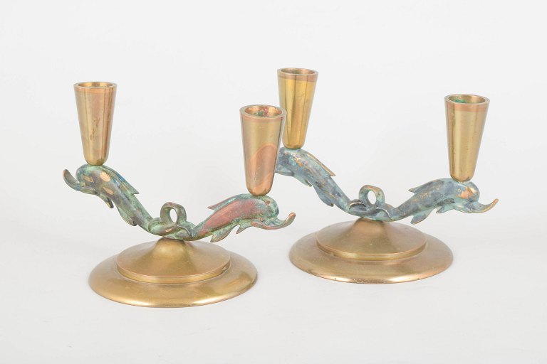 Tinos Denmark, pair of bronze candlesticks with dolphins.
