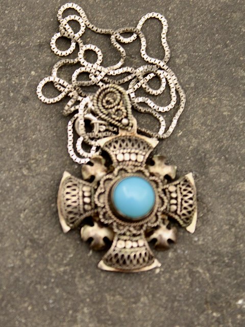 Sterling silver pendant with turquoise
