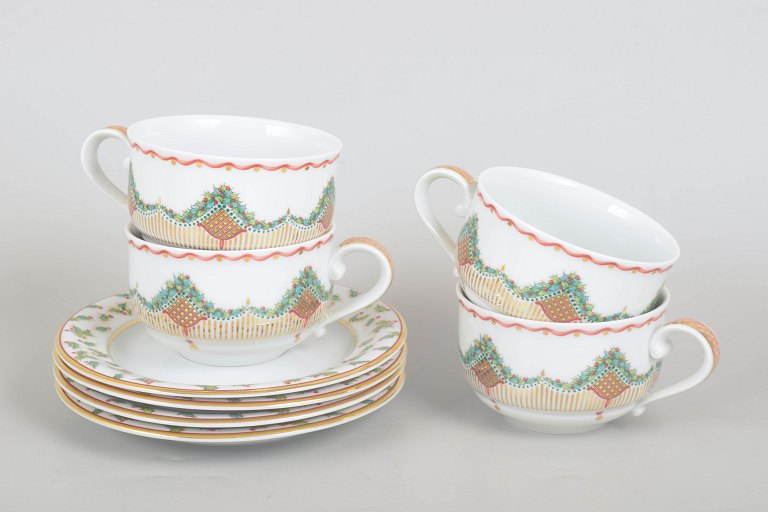 Royal Copenhagen Christmas Joy, set of four tea cups with saucers.